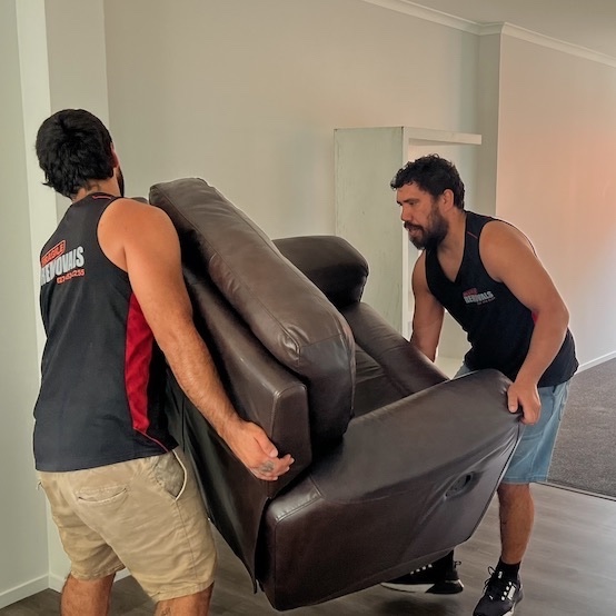 Fragile Removals team moving furniture safely in a Waikato home